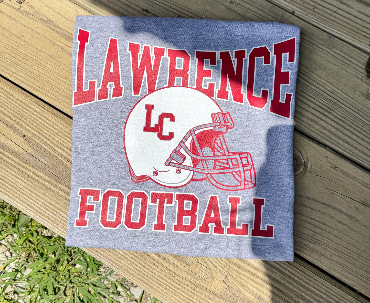 LAWRENCE FOOTBALL ON GREY-CLEARANCE