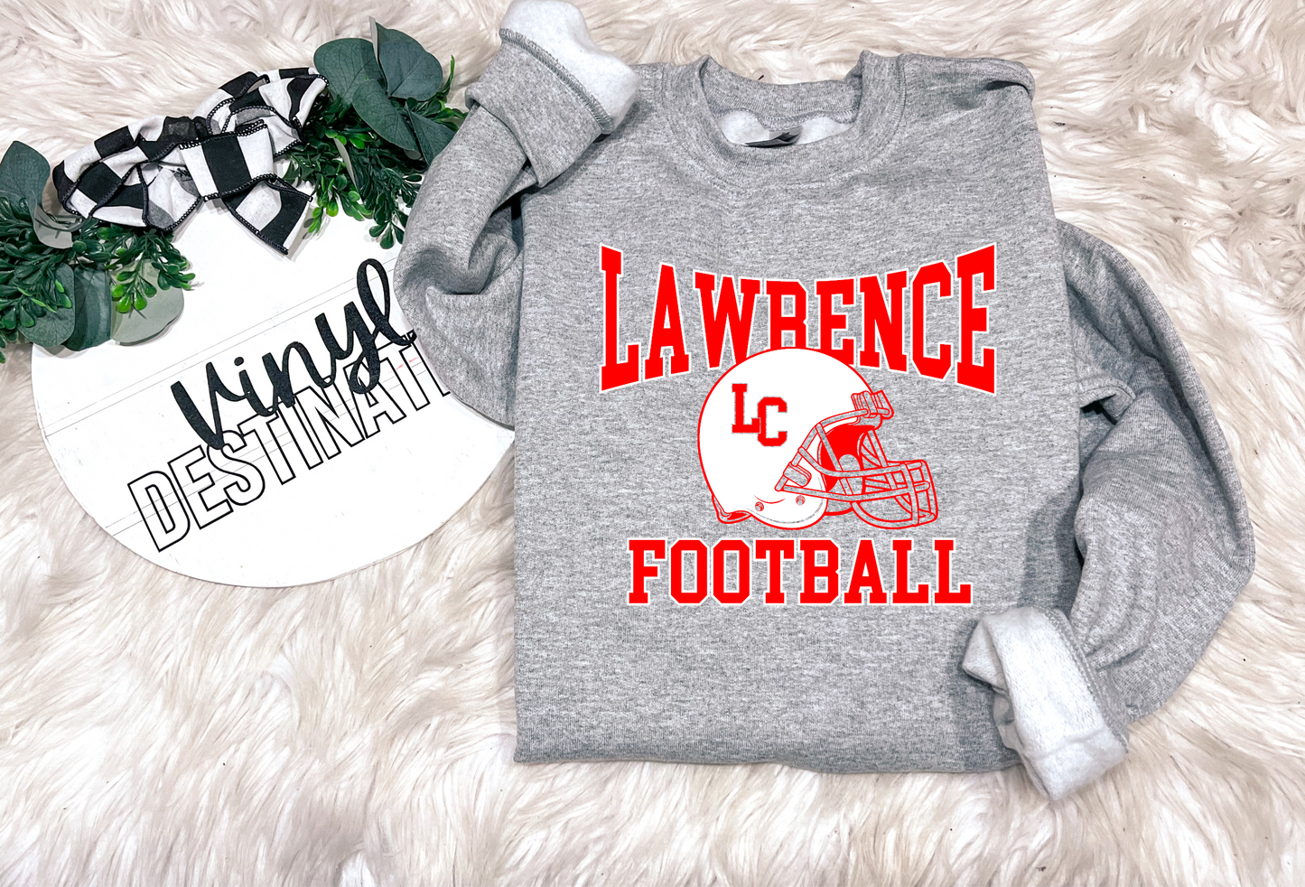 LAWRENCE FOOTBALL HELMET ON GREY CREWNECK SWEATSHIRT